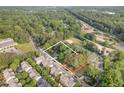 Aerial view of property with outlined property lines, near a baseball field at 408 Madison Ave, Cary, NC 27513