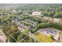 Aerial view of property with outlined property lines and W Chatham St at 408 Madison Ave, Cary, NC 27513