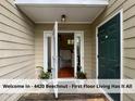Inviting home entrance, featuring bright sidelights, and a view of the beautiful interior at 4420 Beechnut Ln, Durham, NC 27707