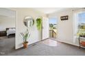 Bright and airy entryway with a welcoming open door and stylish decor at 7228 Lowery Meadow Dr, Wendell, NC 27591