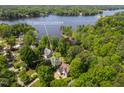 Aerial view showing the address 959 Sagamore Dr Louisburg near a lake at 959 Sagamore Dr, Louisburg, NC 27549