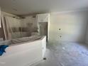 Kitchen with lots of cabinets and a center island, providing ample space for storage and food preparation at 1000 Peedin Rd, Selma, NC 27576