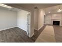 This well lit office features gorgeous hardwood flooring and a glass door for privacy and style at 1000 Peedin Rd, Selma, NC 27576