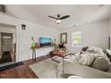 Cozy living room with modern decor, a comfortable sofa, and lots of natural light at 12601 Boyce Mill Rd, Raleigh, NC 27613