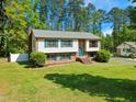 Traditional two-story home featuring blue shutters and a well-maintained lawn at 1624 Cone Ave, Apex, NC 27502