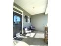 Inviting front porch with comfortable seating, ideal for relaxation at 173 Silver Tee Ct, Selma, NC 27576