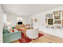 Bright and inviting living room with stylish furnishings, hardwood floors, and eclectic decor at 2014 Walnut St, Durham, NC 27705