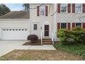 Close up of entry to this delightful residence with a two car garage at 207 Ashley Brook Ct, Cary, NC 27513