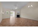 Inviting living room featuring a fireplace, ceiling fan, and neutral walls and flooring at 4105 Gilchrist Dr, Burlington, NC 27215