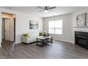 Inviting living room with a fireplace, neutral colors, and ample natural light at 929 Mailwood Dr, Knightdale, NC 27545