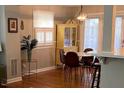 Bright dining area featuring hardwood floors, and natural light from windows at 1045 Nichols Dr, Raleigh, NC 27605