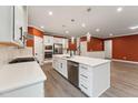 The kitchen features modern appliances, a large island, and an eat-in kitchen at 1216 Edgemoore Trl, Wake Forest, NC 27587