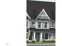 Charming two-story home with gray siding, white trim, and a well-manicured lawn at 3022 White Rail Dr, Fuquay Varina, NC 27526