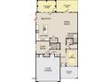 First floor plan featuring an open kitchen, guest room, and seamless flow to the patio at 4311 Emeline Way # 13, Fuquay Varina, NC 27526