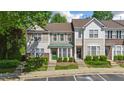 Charming townhome with a well-manicured lawn and inviting curb appeal at 5318 Crescentview Pkwy, Raleigh, NC 27606
