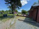 This home has a backyard with a patio for entertaining and relaxing at 706 Orchard Dr, Graham, NC 27253