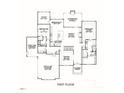 First floor plan showcasing a kitchen, dining room, primary suite, breakfast nook, and two-car garage at 7301 Wexford Woods Ln, Wake Forest, NC 27587