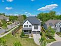 An aerial view shows the property's location in a well-maintained neighborhood with mature trees and green spaces at 7510 Latteri Ct, Raleigh, NC 27613