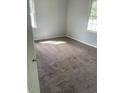 Neutral bedroom with carpet, light gray walls, and great sunlight at 801 E Highland Ave, Rocky Mount, NC 27801