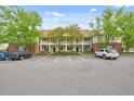 Spacious parking lot for residents and guests, surrounded by lush greenery and classic architecture at 1123 Claret Ln, Morrisville, NC 27560