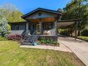 Attractive single-story home with a yellow front door and a welcoming front porch at 1317 Kelly Rd, Garner, NC 27529