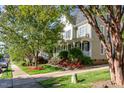 Inviting home showcasing manicured lawn, sidewalk, and mature landscaping at 161 Fort Jackson Rd, Morrisville, NC 27560