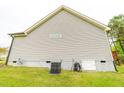 Home exterior showing side of house, siding, and utility features at 201 Lexington Park Dr, Oxford, NC 27565