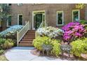 Elegant brick home entrance with decorative landscaping and stylish entrance way at 2901 Hunters Bluff Dr, Raleigh, NC 27606