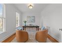Well-lit office space with hardwood floors, stylish furnishings, and a calming atmosphere at 5016 Dillswood Ln, Raleigh, NC 27606