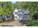 Two-story home with a well-maintained front lawn and a two car garage at 8012 Glenbrittle Way, Raleigh, NC 27615