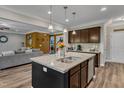 Spacious kitchen island featuring granite countertops and stainless steel appliances at 106 Neuse Bluff Cir, Clayton, NC 27527
