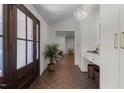 Elegant foyer features a decorative tiled floor, stylish lighting, and a charming entryway at 1310 Mayfair Rd, Raleigh, NC 27608