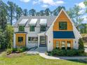 Charming two-story home with a modern farmhouse design with wooden accents at 1616 Hunting Ridge Rd, Raleigh, NC 27615