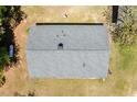 Aerial view of the home's roof, showing its size, shape, and the surrounding landscape at 19461 Nc Highway 210, Angier, NC 27501