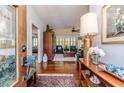 Welcoming entryway with hardwood floors, elegant decor, and views into the living area at 524 Auguston Ct, Sanford, NC 27330