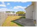 Fenced backyard with a concrete patio, perfect for entertaining at 632 Hunters Ridge Dr, Fuquay Varina, NC 27526
