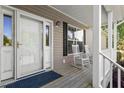 Cozy front porch with rocking chairs, perfect for relaxing outdoors at 3604 Stagecoach Rd, Durham, NC 27713