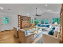 Inviting living room featuring a fireplace, vaulted ceilings, and ample natural light at 480 Big Branch Dr, Pittsboro, NC 27312