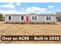 Well-maintained one-story home built in 2020, nestled on over an acre of land at 7289 Nc 561, Louisburg, NC 27549