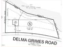 Detailed plot plan showing the lot dimensions, house placement, and property boundaries, including road and setbacks at 213 Delma Grimes Rd, Coats, NC 27521