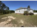 Spacious backyard with ample space for outdoor activities, complemented by a well-maintained lawn at 226 Kandypoo Dr, Four Oaks, NC 27524