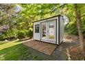 Rear yard outbuilding perfect for workshop, office, or storage at 417 S Fourth St, Mebane, NC 27302