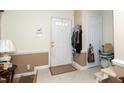 Welcoming foyer with neutral tones and a coat rack, providing ample storage at 5500 Fortunes Ridge Dr # 82B, Durham, NC 27713