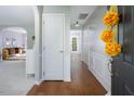 Inviting foyer with hardwood floors and neutral wall colors at 612 Spring Meadow Dr, Durham, NC 27713