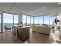 Bright, open living space with floor-to-ceiling windows and sleek modern decor at 110 N Corcoran St # 2101, Durham, NC 27701