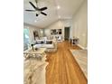 Spacious living room featuring hardwood floors, high ceilings, and natural light at 131 Rosewood Dr Dr, Roxboro, NC 27573
