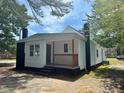 Cozy home boasting a covered porch and a freshly painted exterior at 1336 Hill St, Rocky Mount, NC 27801
