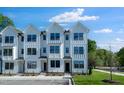 Beautiful new construction townhomes feature modern design and inviting curb appeal at 1533 Crescent Townes Way, Raleigh, NC 27604
