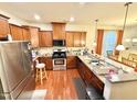 Kitchen with stainless steel appliances, granite counters, and lots of cabinet space at 5410 Jessip Street St, Morrisville, NC 27560