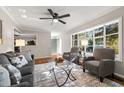 Inviting living room with hardwood floors, plenty of natural light, and comfortable seating at 1701 Pinedale Dr, Raleigh, NC 27603